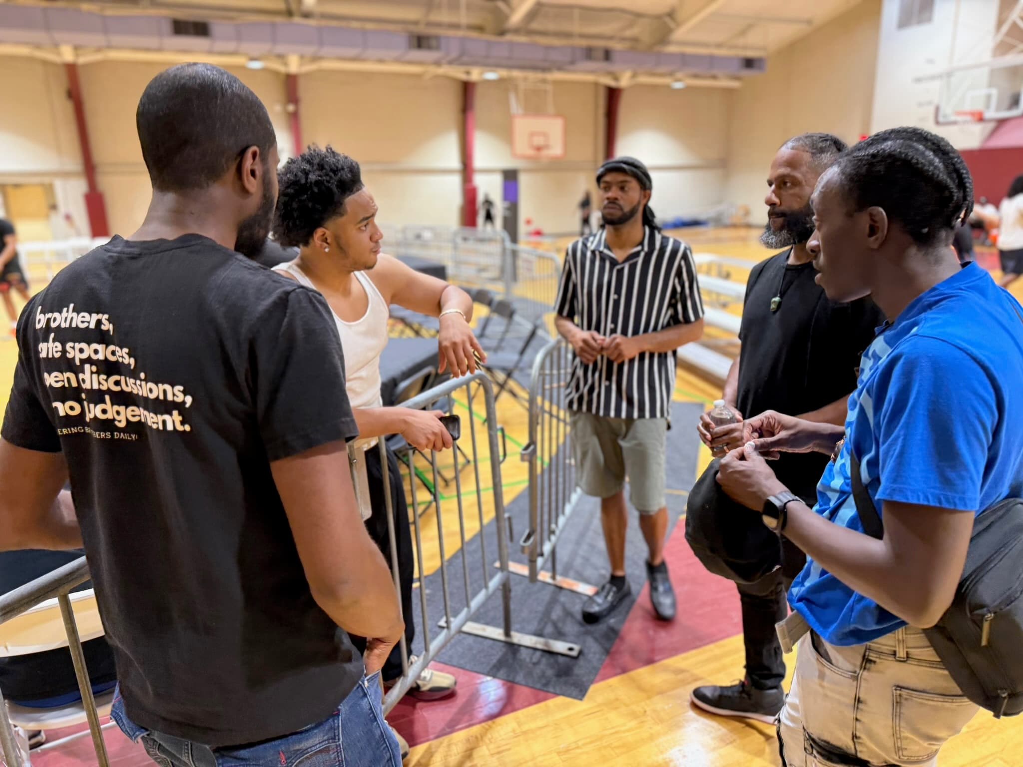 Brothers representing Undugu at a Morehouse community event
