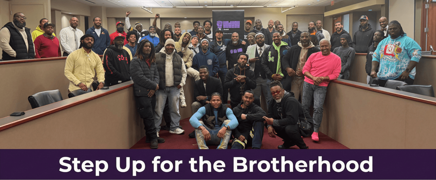 A brother stepping up to the mic at Undugu Speaks